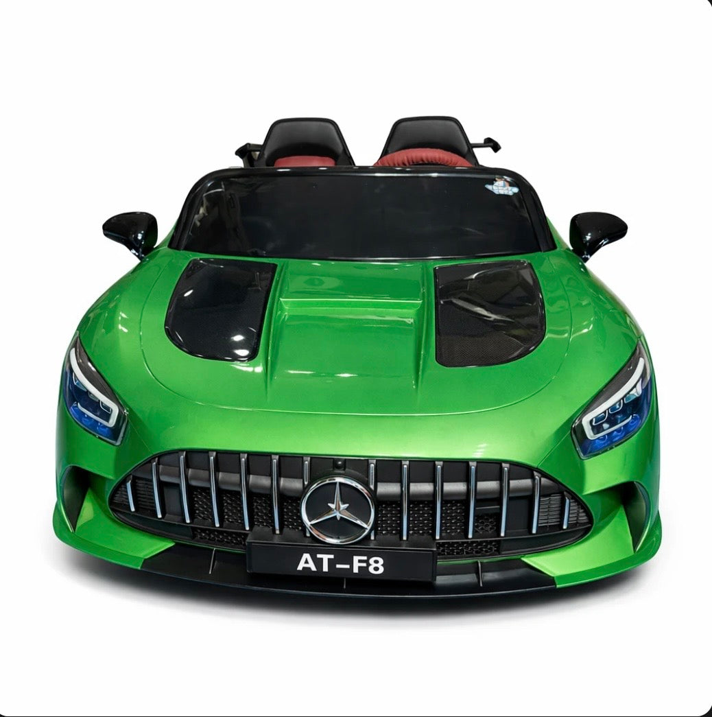 Red Mercedes AMG GT toy car by Tahito Toys, detailed miniature model with realistic design and sleek exterior.