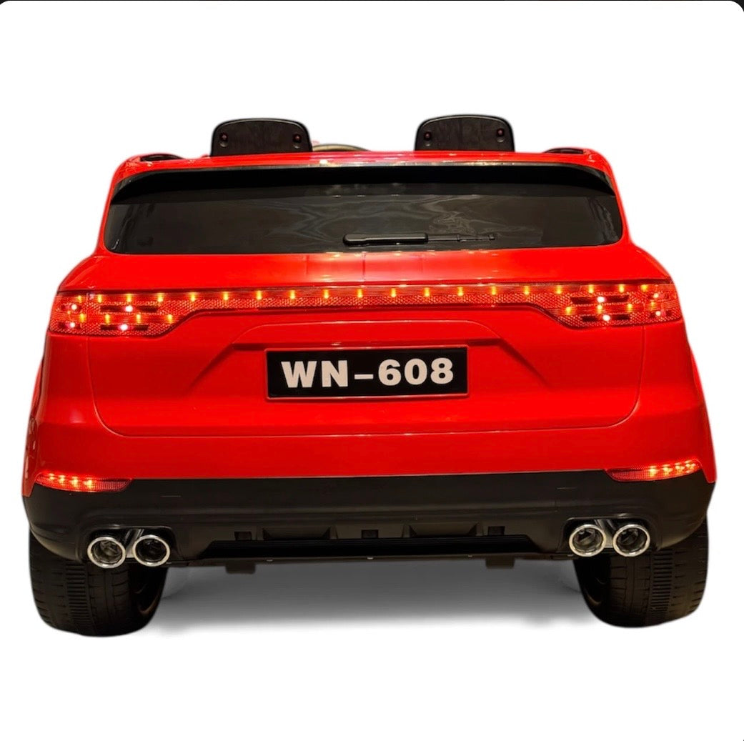 Tahito Toys Porsche Cayenne toy car model in red with detailed exterior and realistic design.