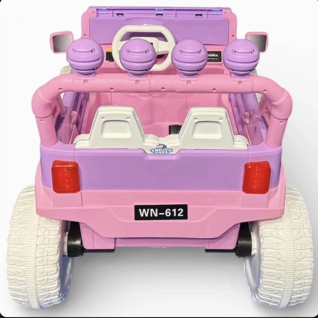 Big girls’ Tahito Toys Jeep Wrangler ride-on toy with pink and purple design, featuring realistic Jeep details and sturdy wheels.